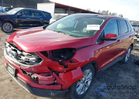 2021 Ford Edge Titanium z USA, uszkodzony, nr VIN 2FMPK4K92MBA08967